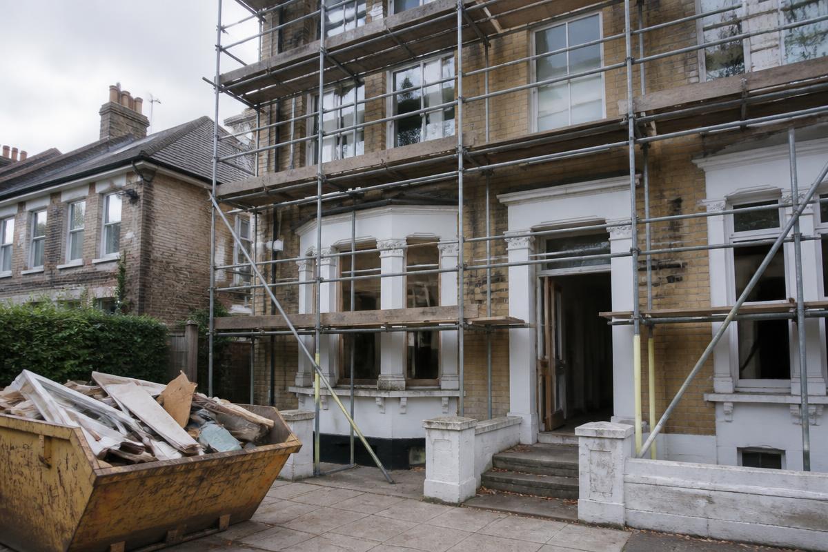 UK Victorian townhouse under scaffolding during a refurbishment funded by bridging finance